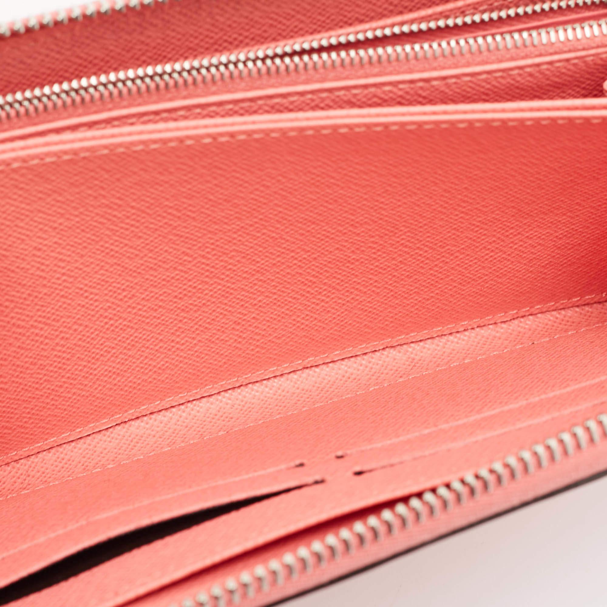 With a rich heritage and meticulous workmanship each creation of Louis Vuitton is sure to impress you with its notable features. This Zippy wallet is conveniently designed for everyday use. Crafted from Coral Epi leather it is paired with a zip