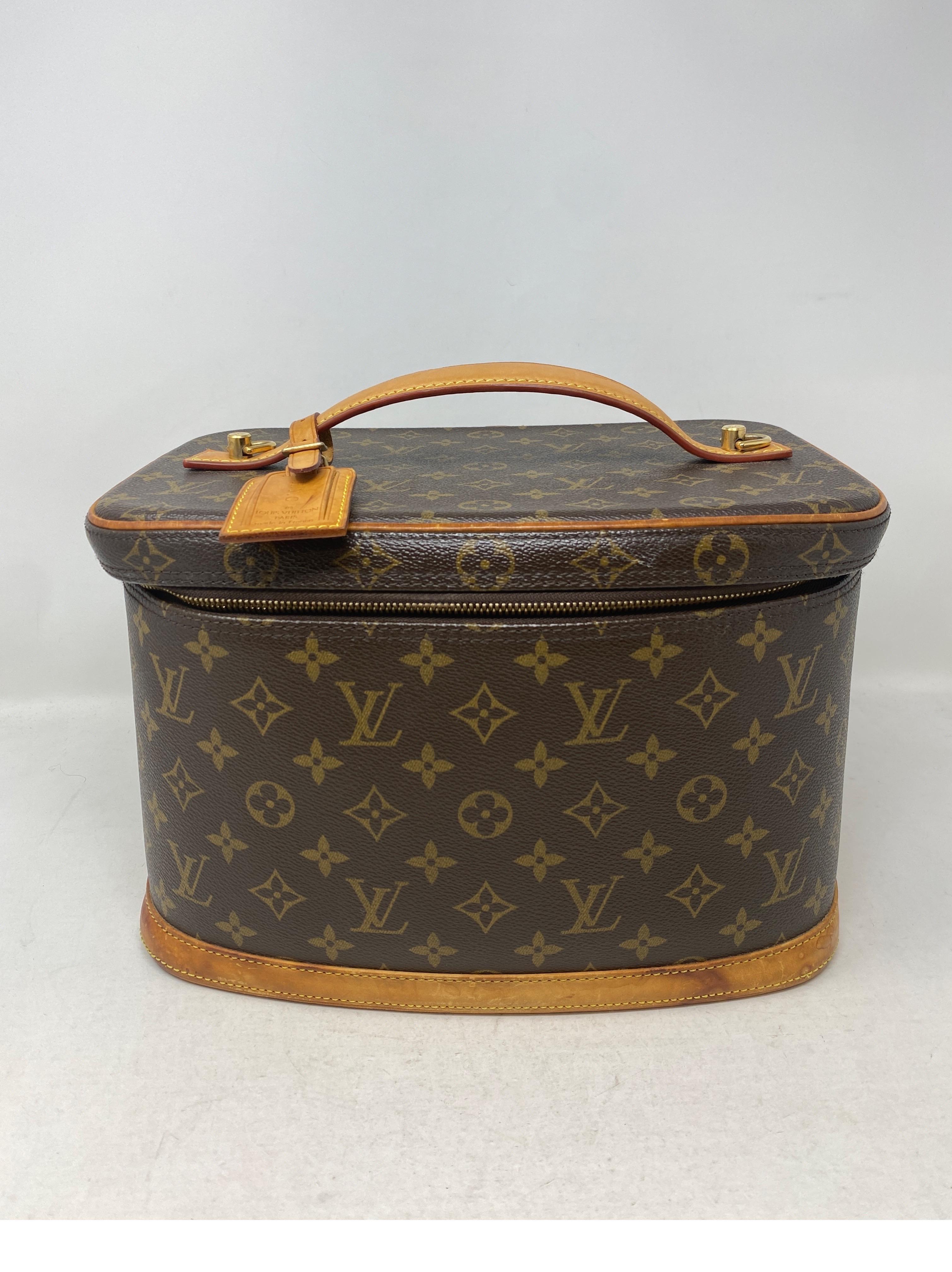 Louis Vuitton Cosmetic Train Case Bag. Vintage Louis Vuitton monogram soft train case. Rare collector's piece. Light wear throughout. Dark patina spots on leather. Interior clean. Great travel bag. Guaranteed authentic. 