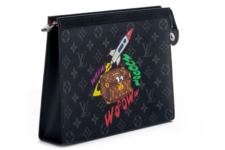 New Authentic Louis Vuitton Men Wallet by Virgil Abloh gets a burst of energy with a colorful new print on Monogram Eclipse canvas: a comics-style little trunk blasting off in a rocket for outer space. Inside, a bright red leather lining enlivens