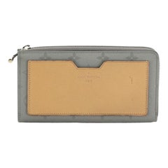 monogram titanium wallet