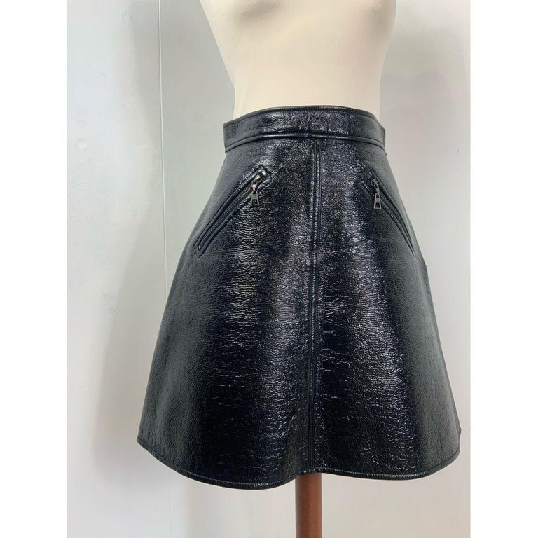 Louis Vuitton Cotton Skirt in Black

Louis Vuitton skirt. In cotton, vinyl effect. Lined in polyamide and elastane. Side closure. Size 38 FR which corresponds to an Italian 42. Measures 36cm waist and 50cm long. Excellent general condition, like
