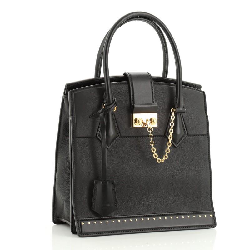 Condition: Good. Light creasing on exterior, minor cracking on side opening wax edges, scuffs in interior, scratches on hardware.
Accessories: Keys, Clochette
Measurements: Handle Drop 4