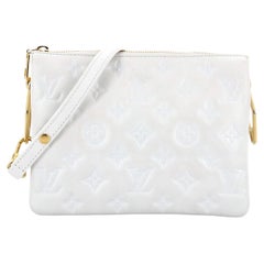 Sold at Auction: Louis Vuitton, Louis Vuitton Coussin Pochette Monogram  Embossed Lambskin Pink