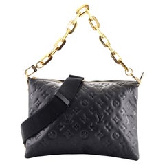 Louis Vuitton Coussin-Tasche aus geprägtem Lammfell mit Monogramm MM