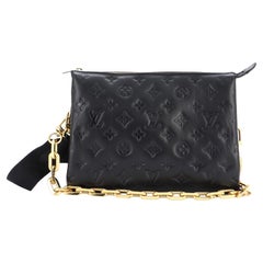 black embossed louis vuitton crossbody