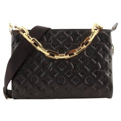 Louis Vuitton Coussin Tasche Monogramm geprägte Puffy Lammfell MM