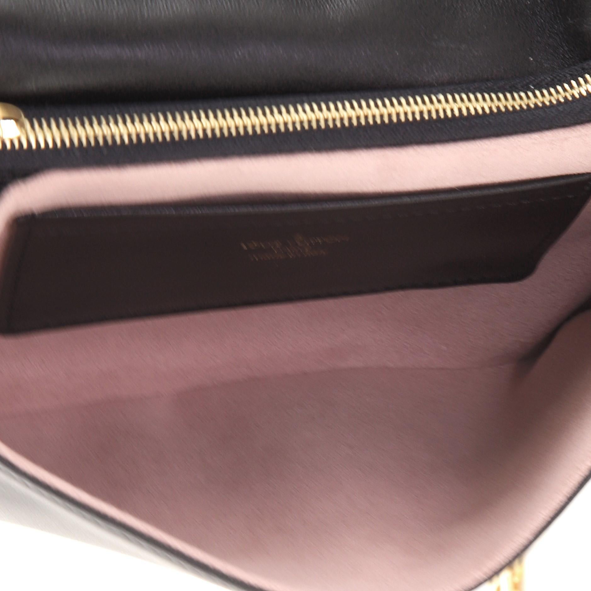 Women's or Men's Louis Vuitton Coussin Pochette Monogram Embossed Lambskin