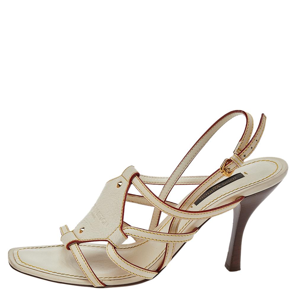 These beautiful sandals from Louis Vuitton are the perfect choice while choosing footwear for any occasion. The cream leather body, contrast stitching, and the gold-toned accents used on the upper a brilliant example of the latest trends. Add a dash