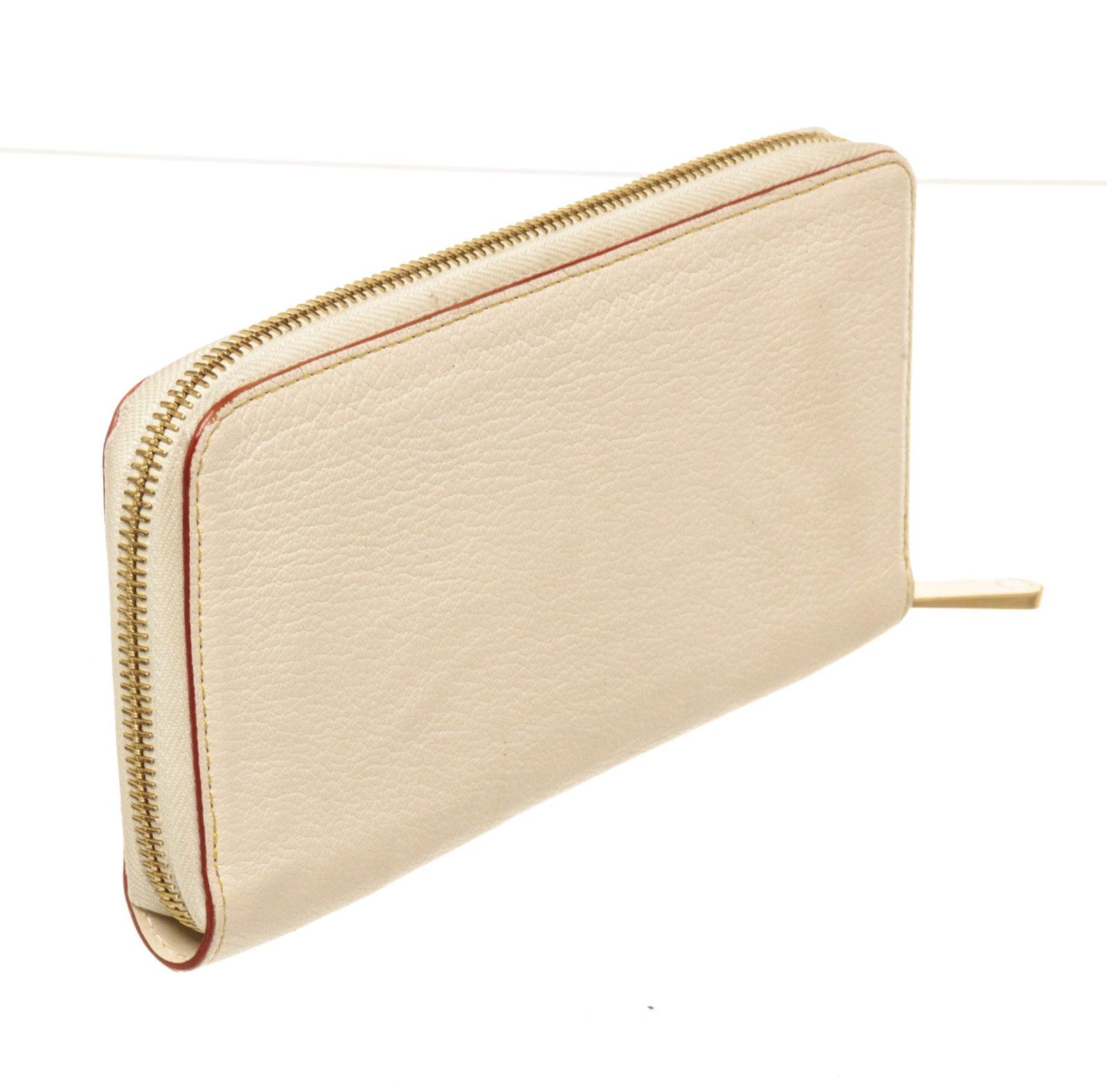 Women's or Men's Louis Vuitton Cream Leather Zippy Wallet
