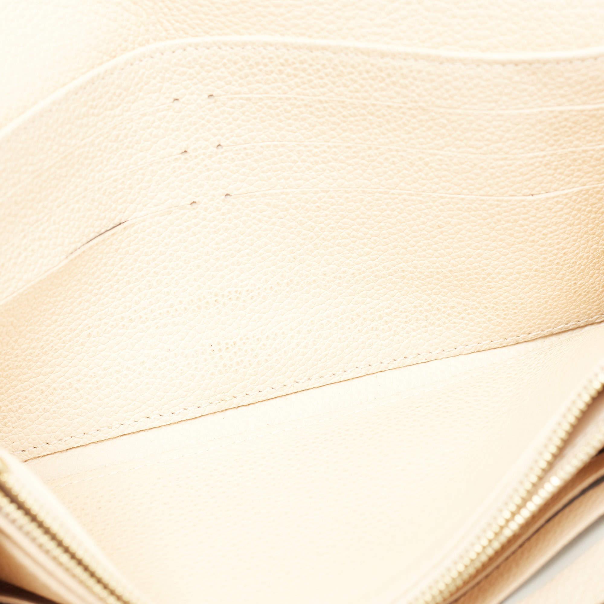 Louis Vuitton Cream Monogram Empreinte Leather Sarah Wallet 8
