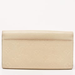 Louis Vuitton Cream Monogram Empreinte Leather Sarah Wallet