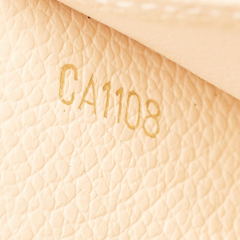 Louis Vuitton Cream Monogram Empreinte Leather Sarah Wallet Louis Vuitton