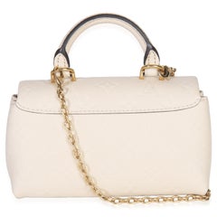 Louis Vuitton Cream Monogram Empreinte Nano Madeleine