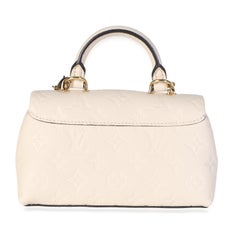 Louis Vuitton Cream Monogram Empreinte Nano Madeleine