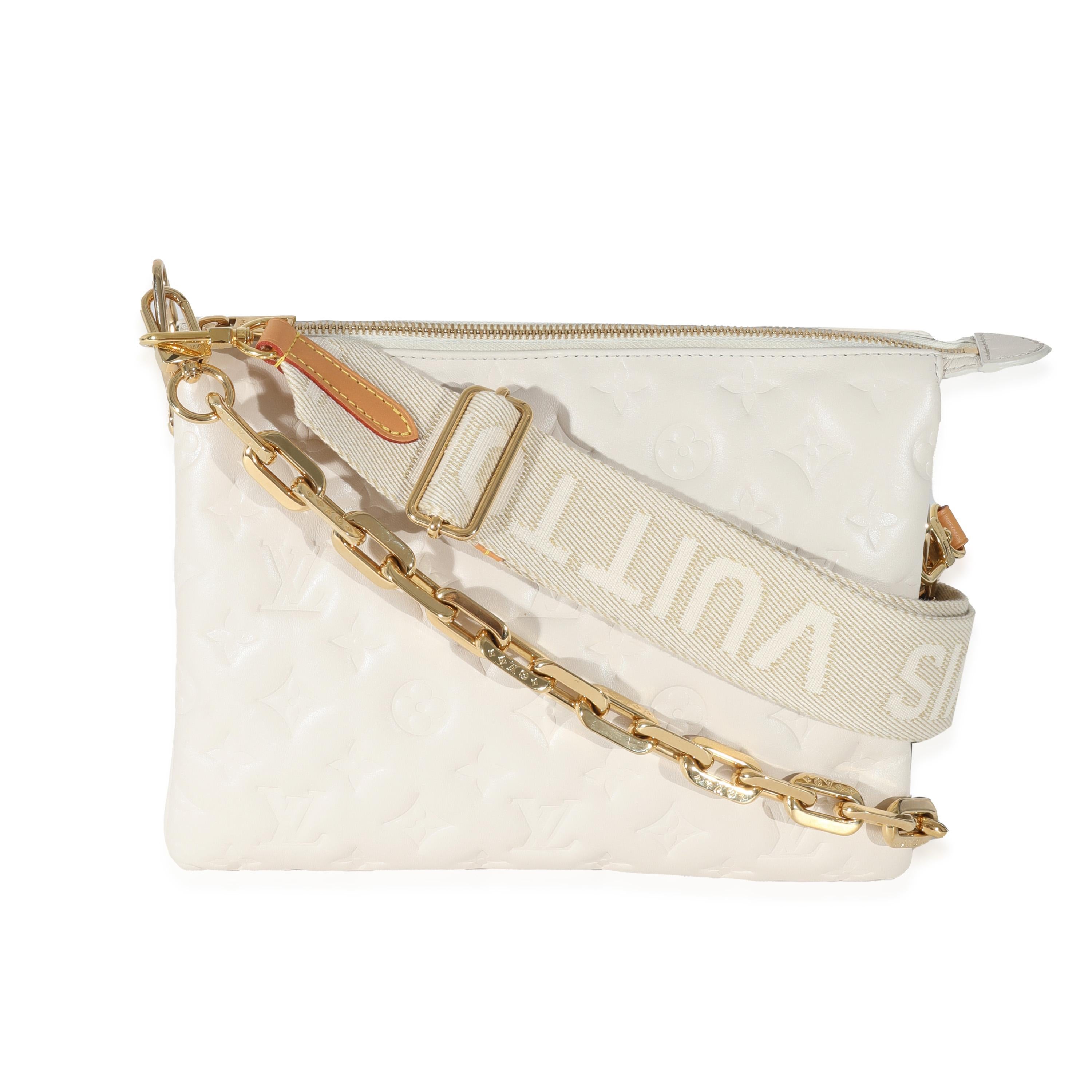 Listing Title: Louis Vuitton Cream Monogram Lambskin Coussin PM
SKU: 131345
MSRP: 4700.00
Condition: Pre-owned 
Handbag Condition: Very Good
Condition Comments: Item is in very good condition with minor signs of wear. Faint marks to leather.