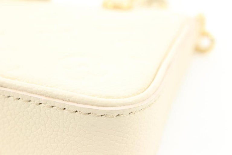 Louis Vuitton Creme Monogram Empreinte Leather Easy Pouch on Strap