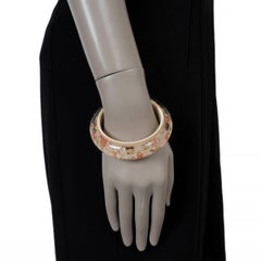 Braccialetto LOUIS VUITTON in resina crema INCLUSION MONOGRAM WIDE