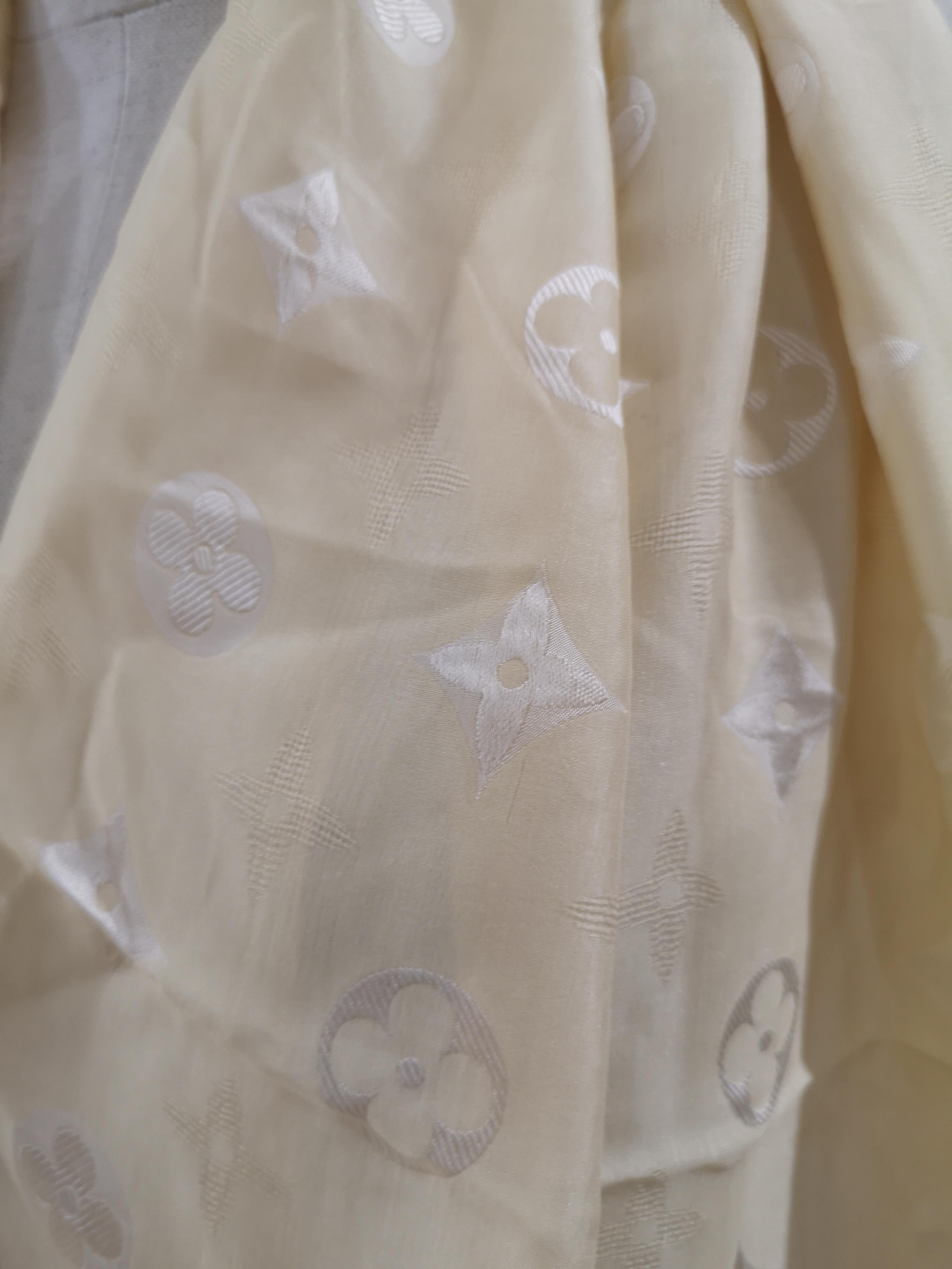 Louis Vuitton cream silk LV Scarf - foulard
measurements;  160 * 50 cm 
