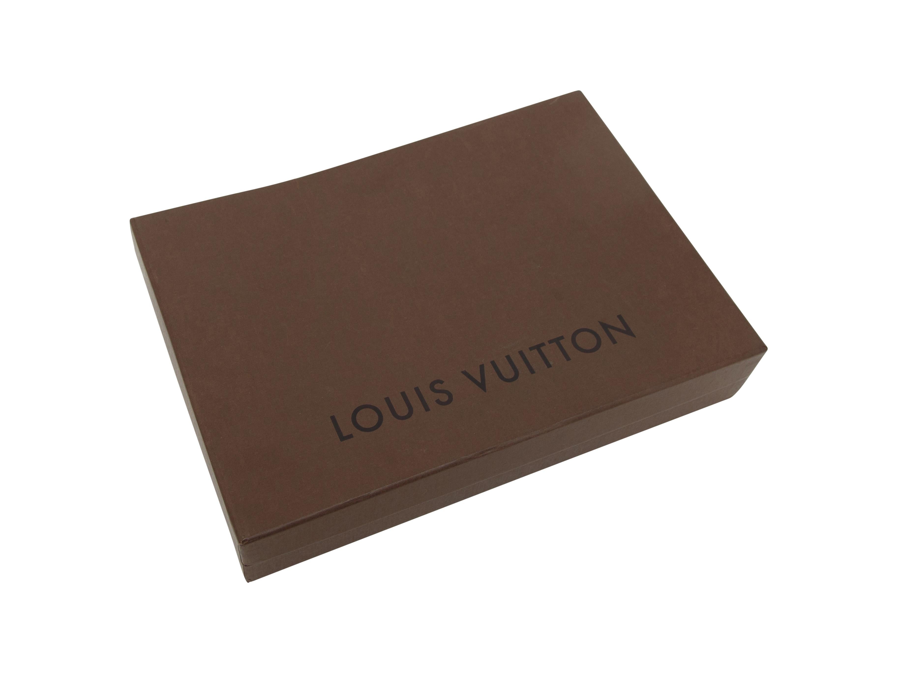Product details: Cream satin headband by Louis Vuitton. From the Spring/Summer 2013 Collection. Bow accent at top. 5.5