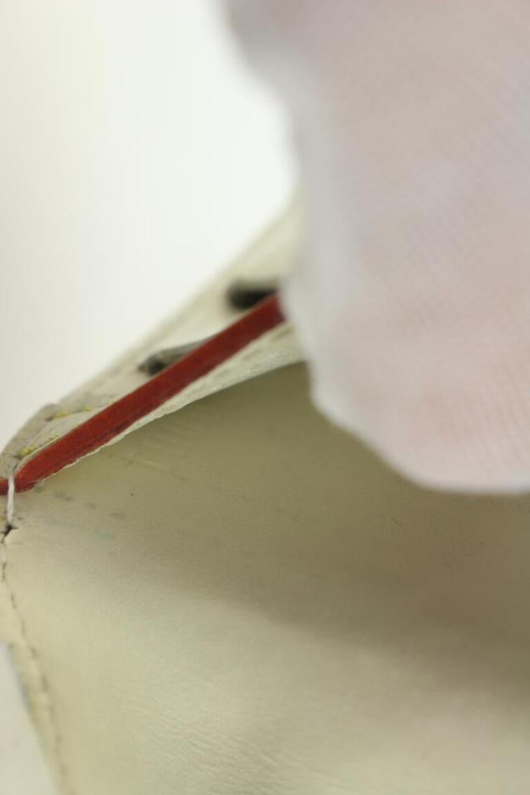 Louis Vuitton Crema Suhali Portafoglio Internazionale Trifold Sarah M91839 In condizioni buone in vendita a Dix hills, NY