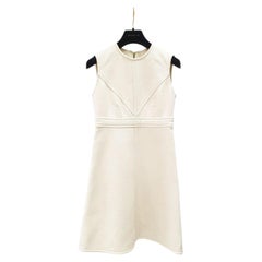 LOUIS VUITTON  Knielanges Kleid aus cremefarbener Wolle in A-Linie Sz.36