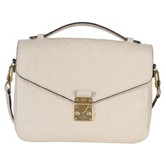 Louis Vuitton Creme Empreinte Pochette Metis