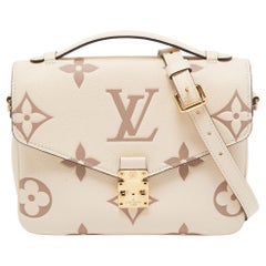 Louis Vuitton Creme Monogram Empreinte Leather Giant Pochette Metis Bag