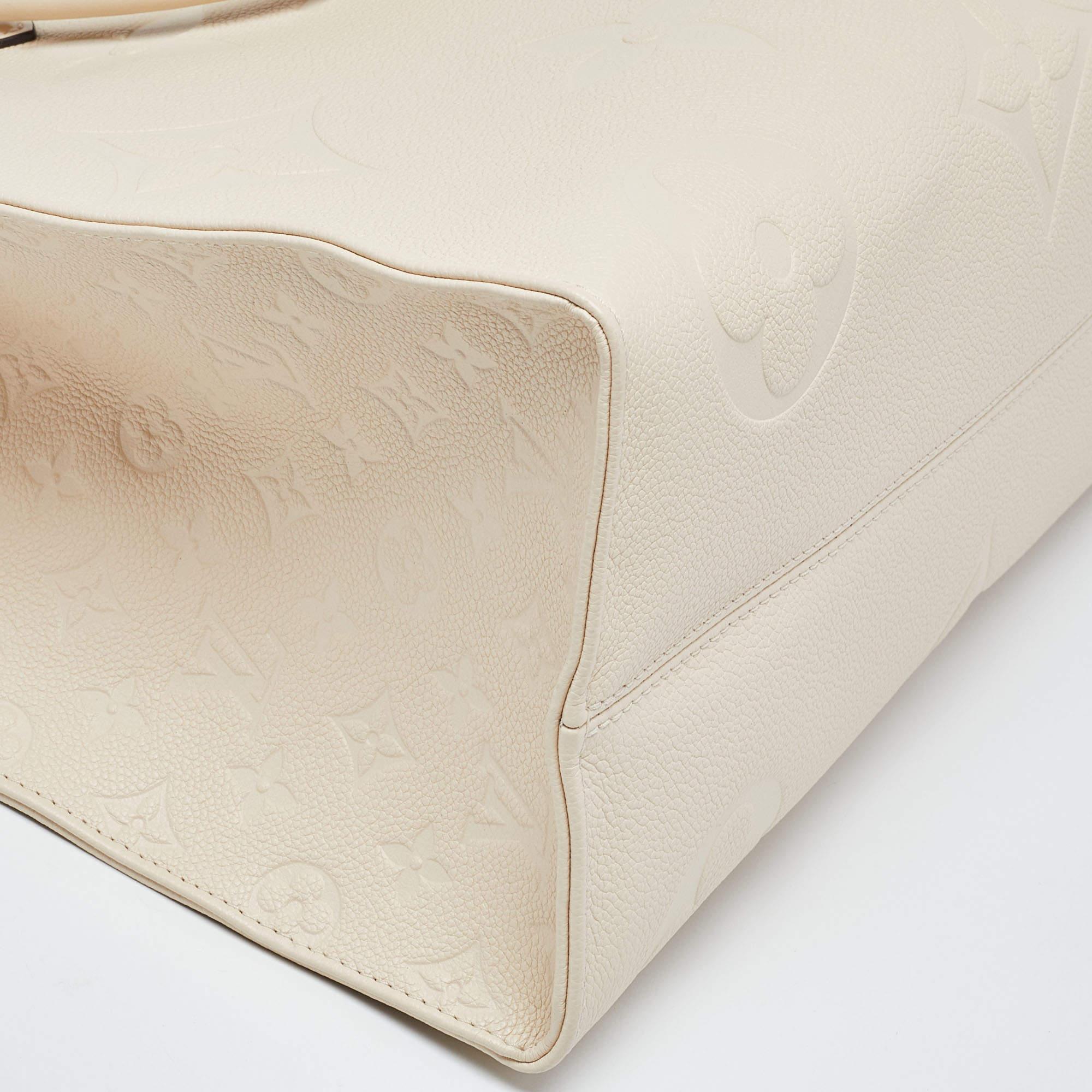 Louis Vuitton Creme Monogram Empreinte Leather Onthego GM Bag In Excellent Condition In Dubai, Al Qouz 2