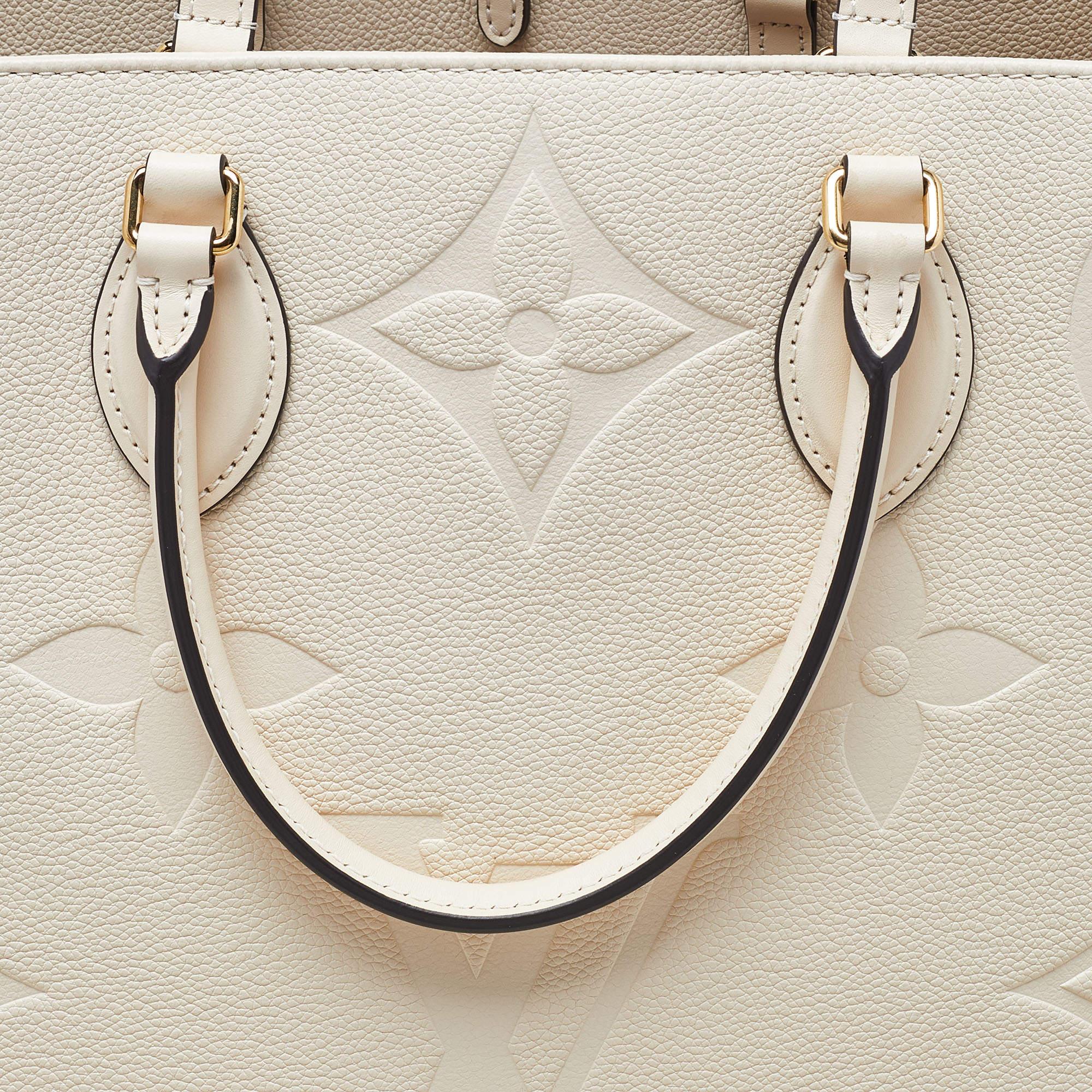 Women's Louis Vuitton Creme Monogram Empreinte Leather Onthego GM Bag