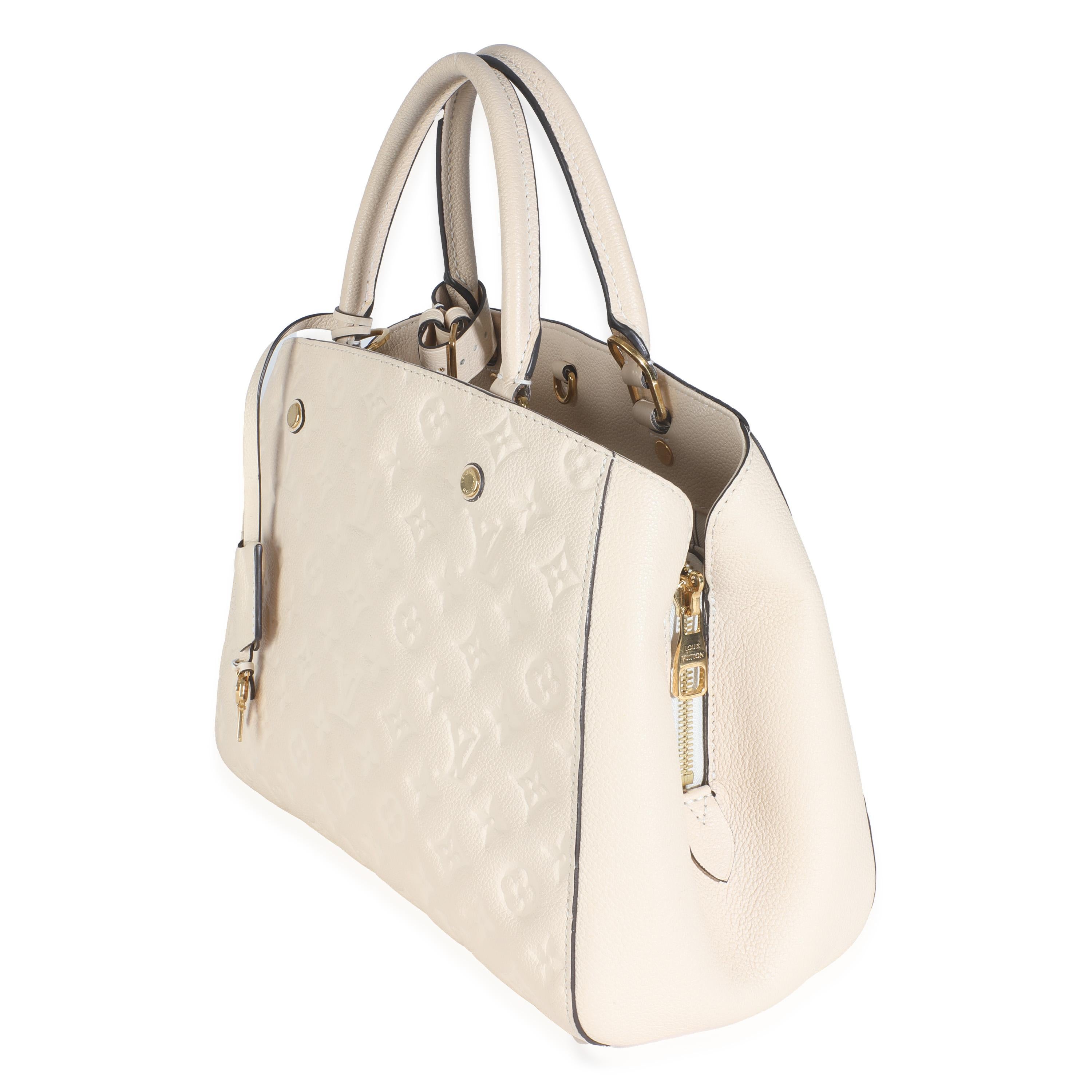 Louis Vuitton Creme Monogram Empreinte Montaigne MM In Excellent Condition For Sale In New York, NY