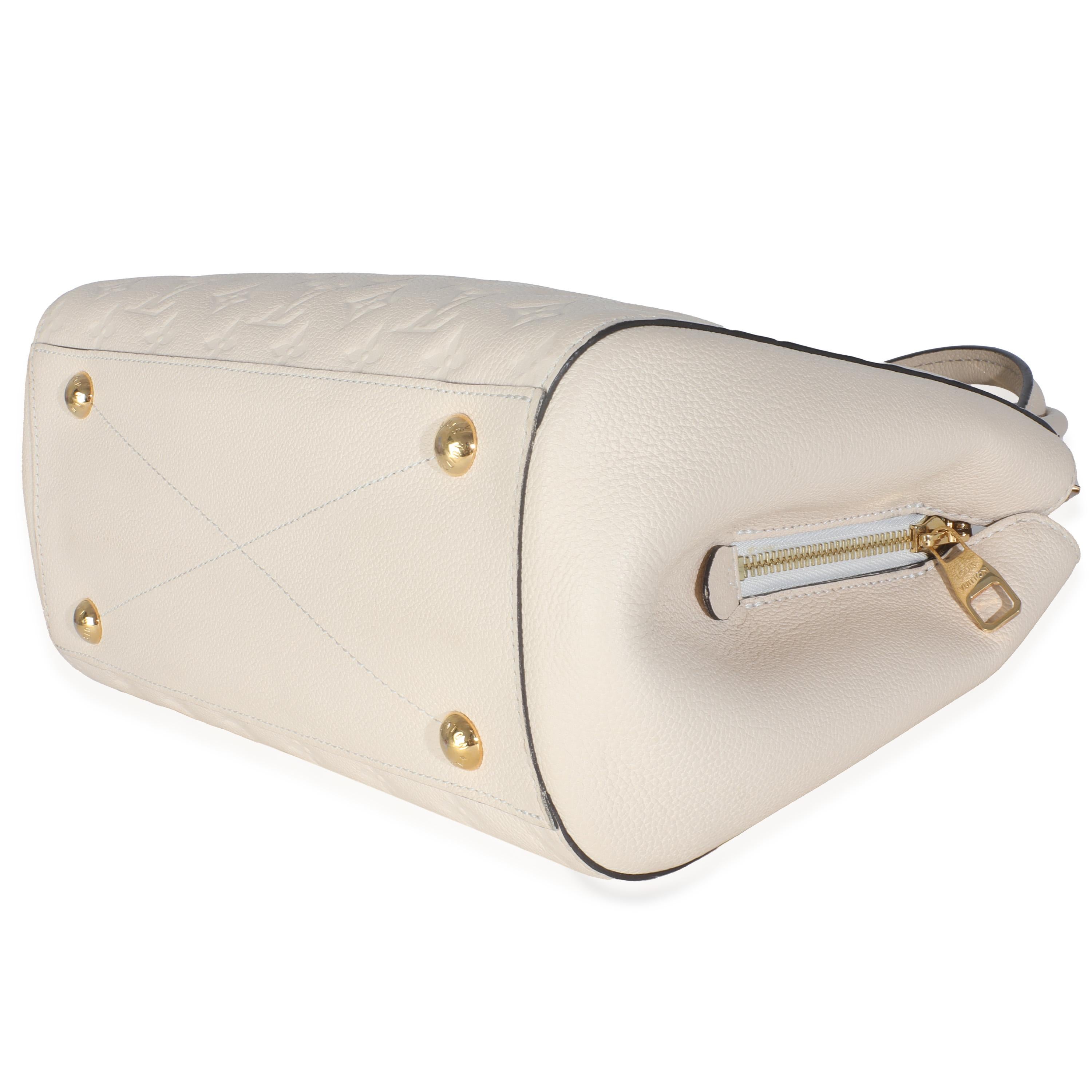 Women's or Men's Louis Vuitton Creme Monogram Empreinte Montaigne MM For Sale