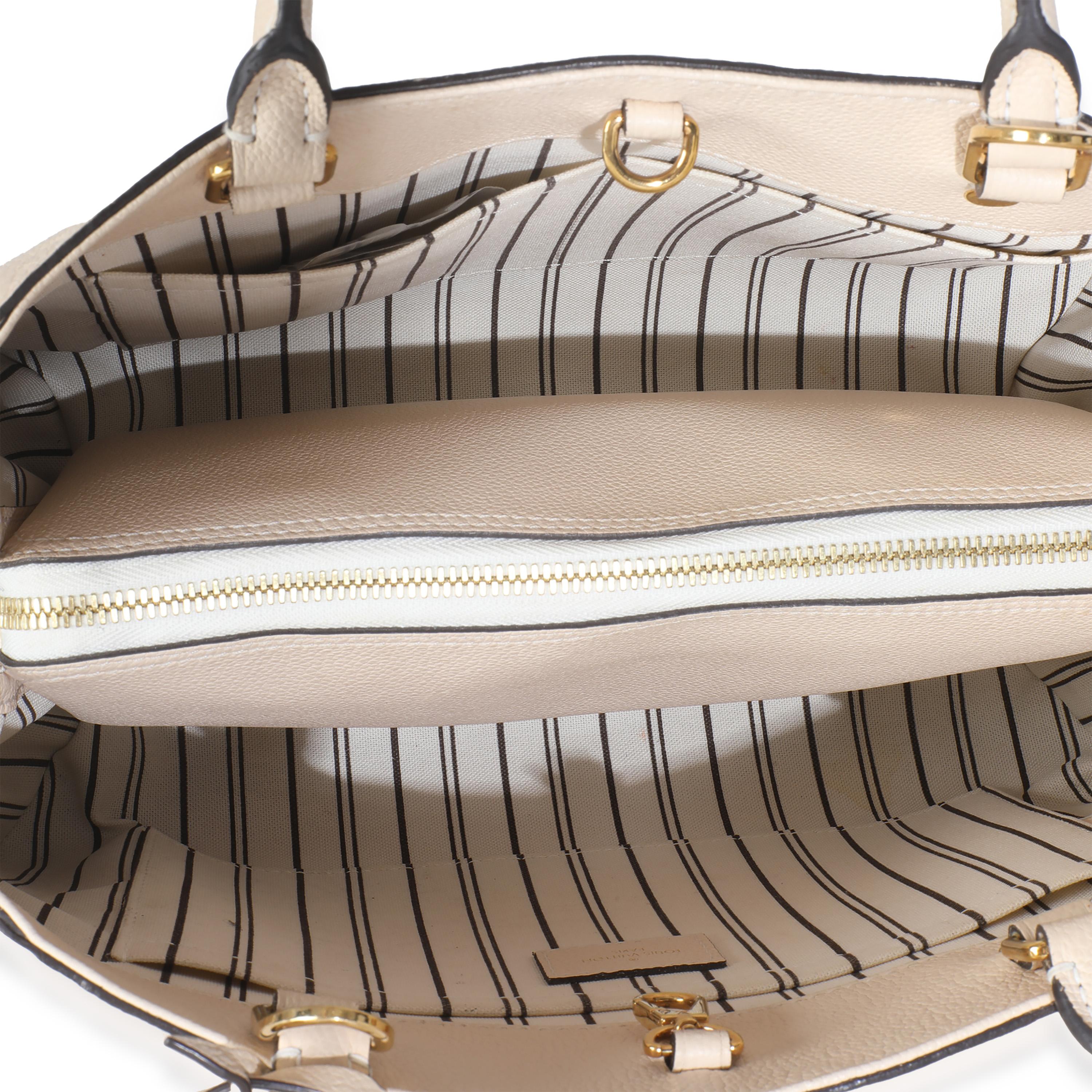 Louis Vuitton Creme Monogram Empreinte Montaigne MM For Sale 1
