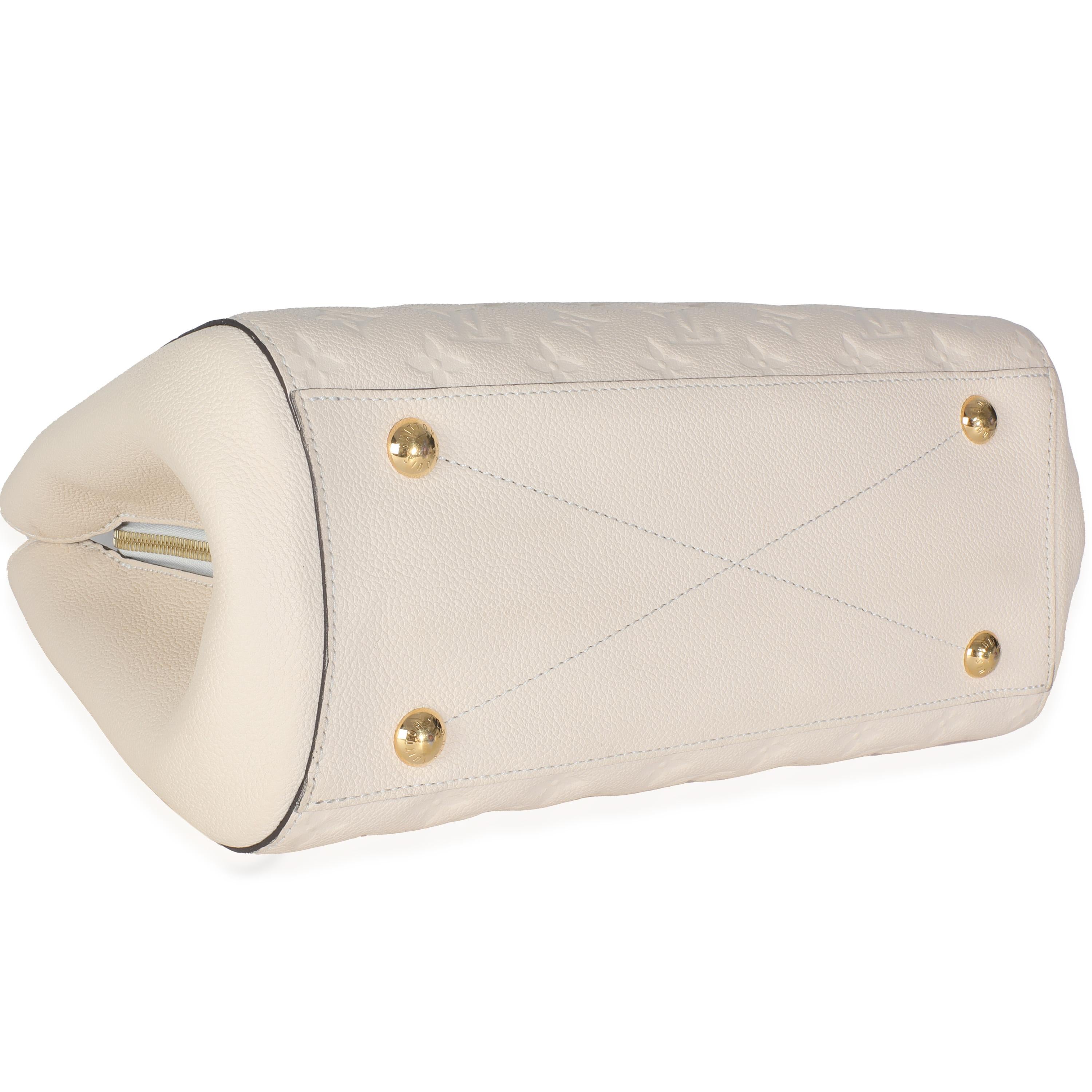 Louis Vuitton Creme Monogram Empreinte Montaigne MM For Sale 2