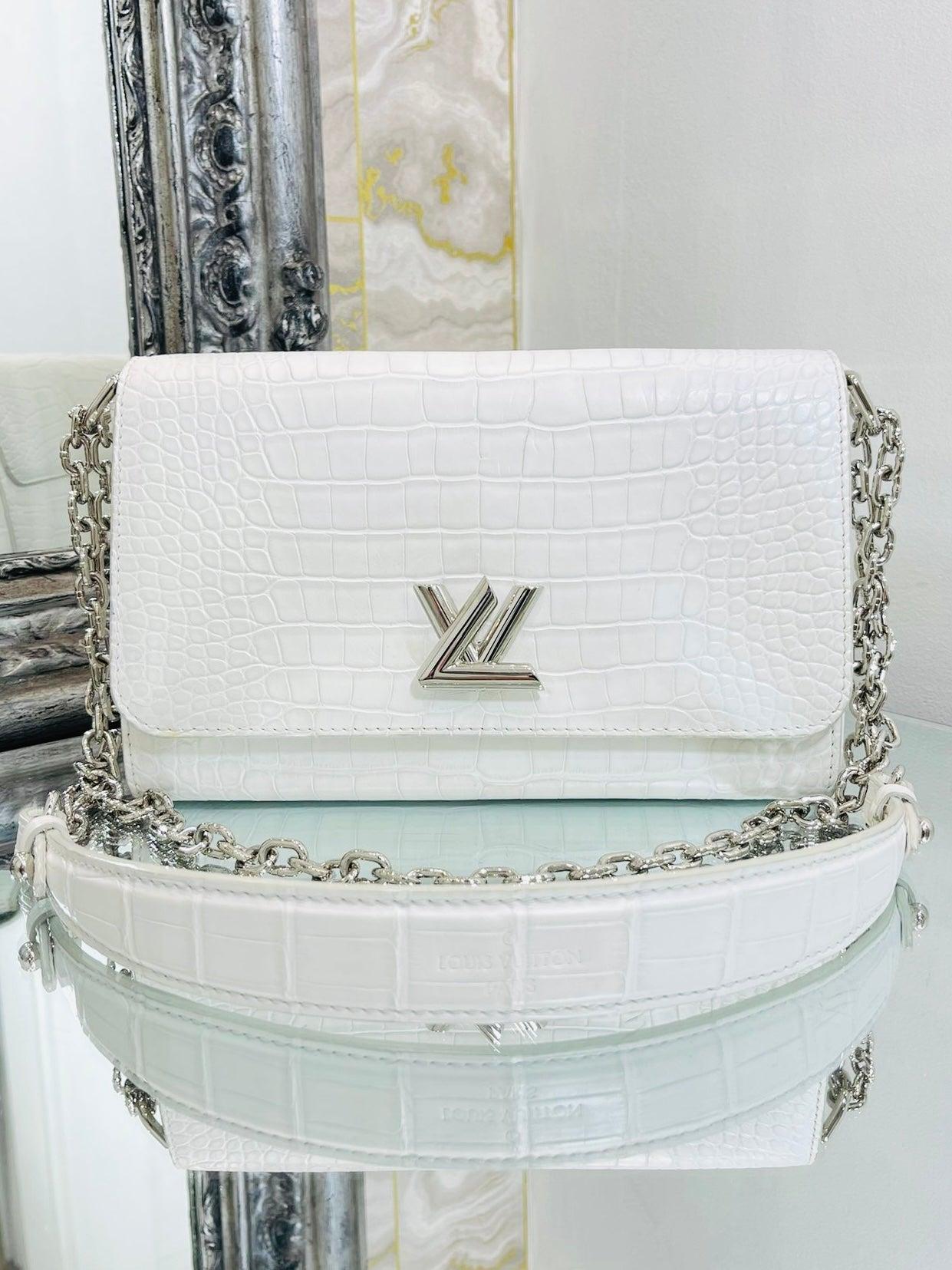 Louis Vuitton Crocodile Skin Bag Twist Bag

Matte white exotic skin bag with shiny silver hardware. Twist 'LV' logo closure and sliding should and Crocodile skin/leather shoulder/crossbody strap.

Additional information:
Size – 23 W x 9 D x 16 H