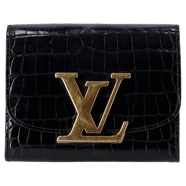 Portafoglio compatto Louis Vuitton Capucines in pelle di