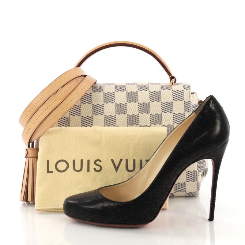 This Louis Vuitton Croisette Handbag Damier, crafted in damier azur coated canvas, features a leather top handle and gold-tone hardware. It opens to a pink fabric interior with slip pocket. Authenticity code reads: TR1126. **Note: Shoe photographed