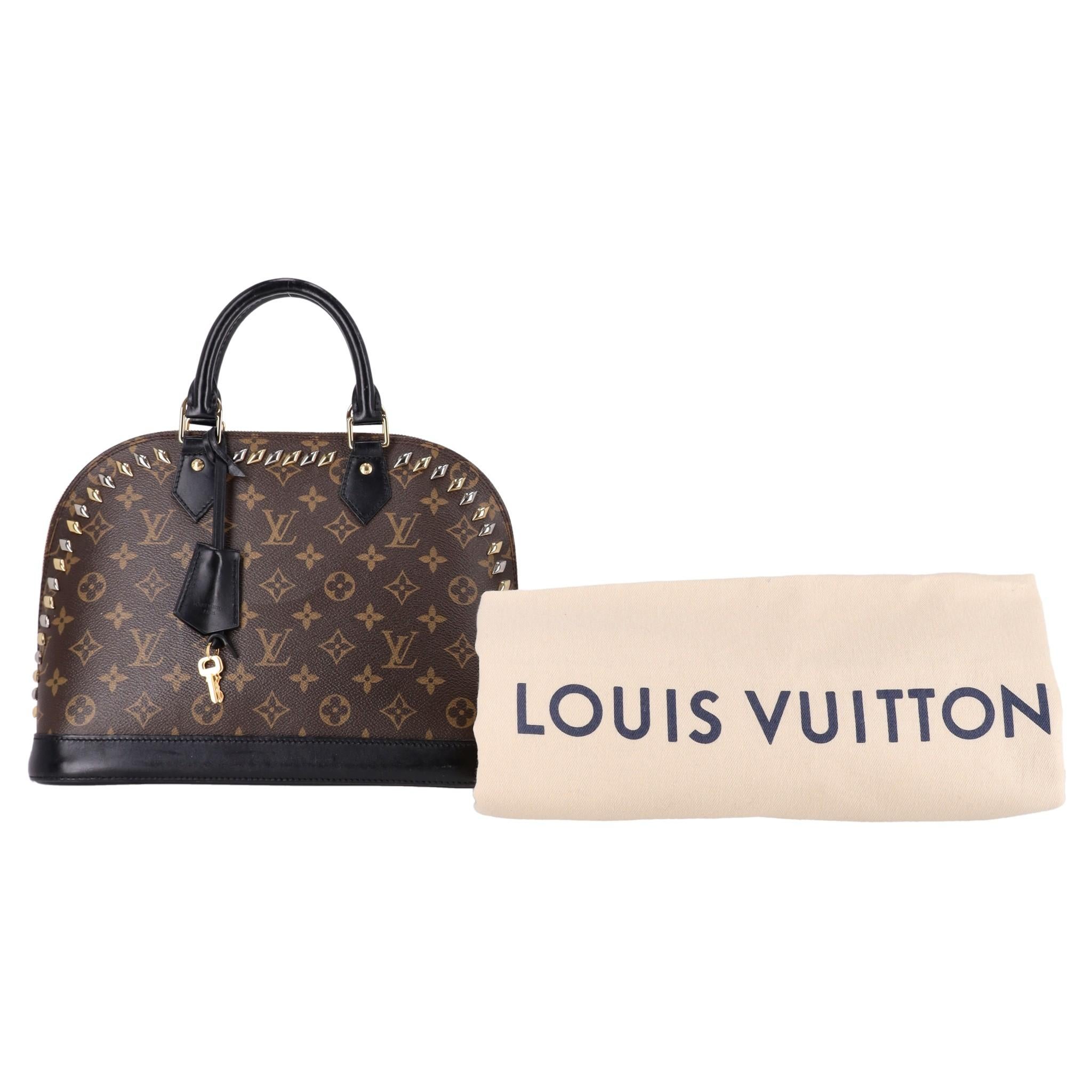  Louis Vuitton Cruise Runway Monogram Macassar Studded Alma Bag

Brown, textured handbag designed with the iconic 'LV' monogram throughout and detailed with gold and silver studs along the edges.

Styled with dark brown leather trims, padlock and