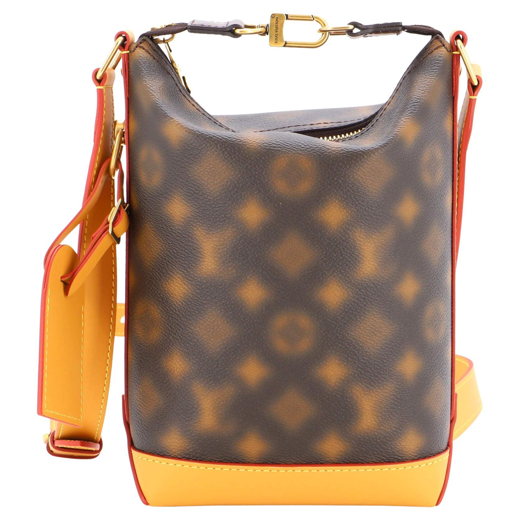 Louis Vuitton Lock It Blurry Monogram Brown in Coated Canvas