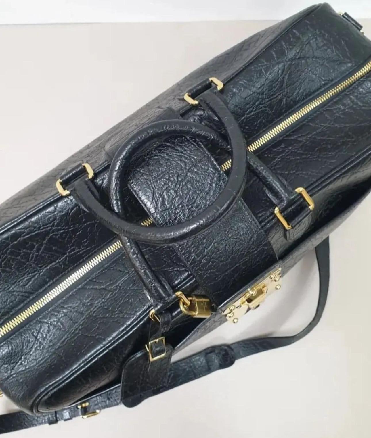 Women's Louis Vuitton Cuir Indra Duffle Bag Black