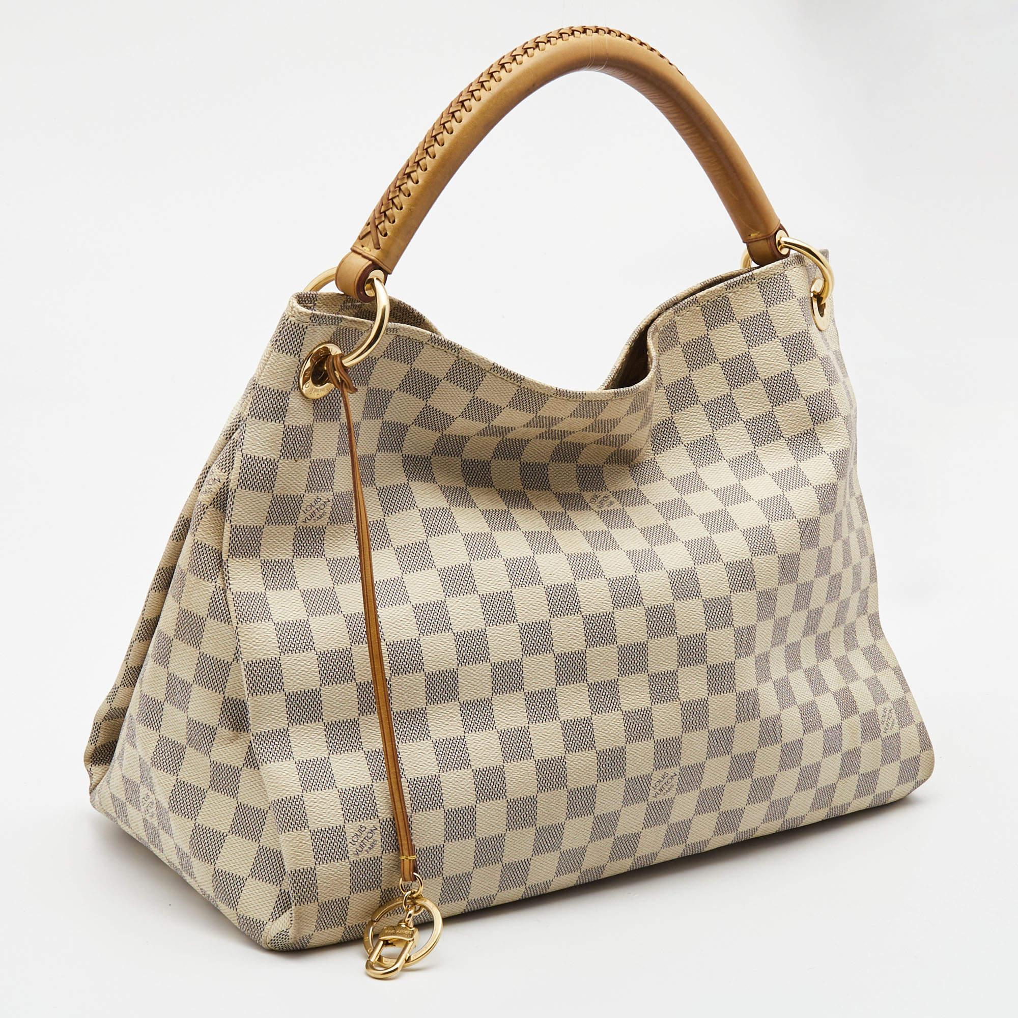 Indulge in luxury with this LV bag. Meticulously crafted from premium materials, it combines exquisite design, impeccable craftsmanship, and timeless elegance. Elevate your style with this fashion accessory.


