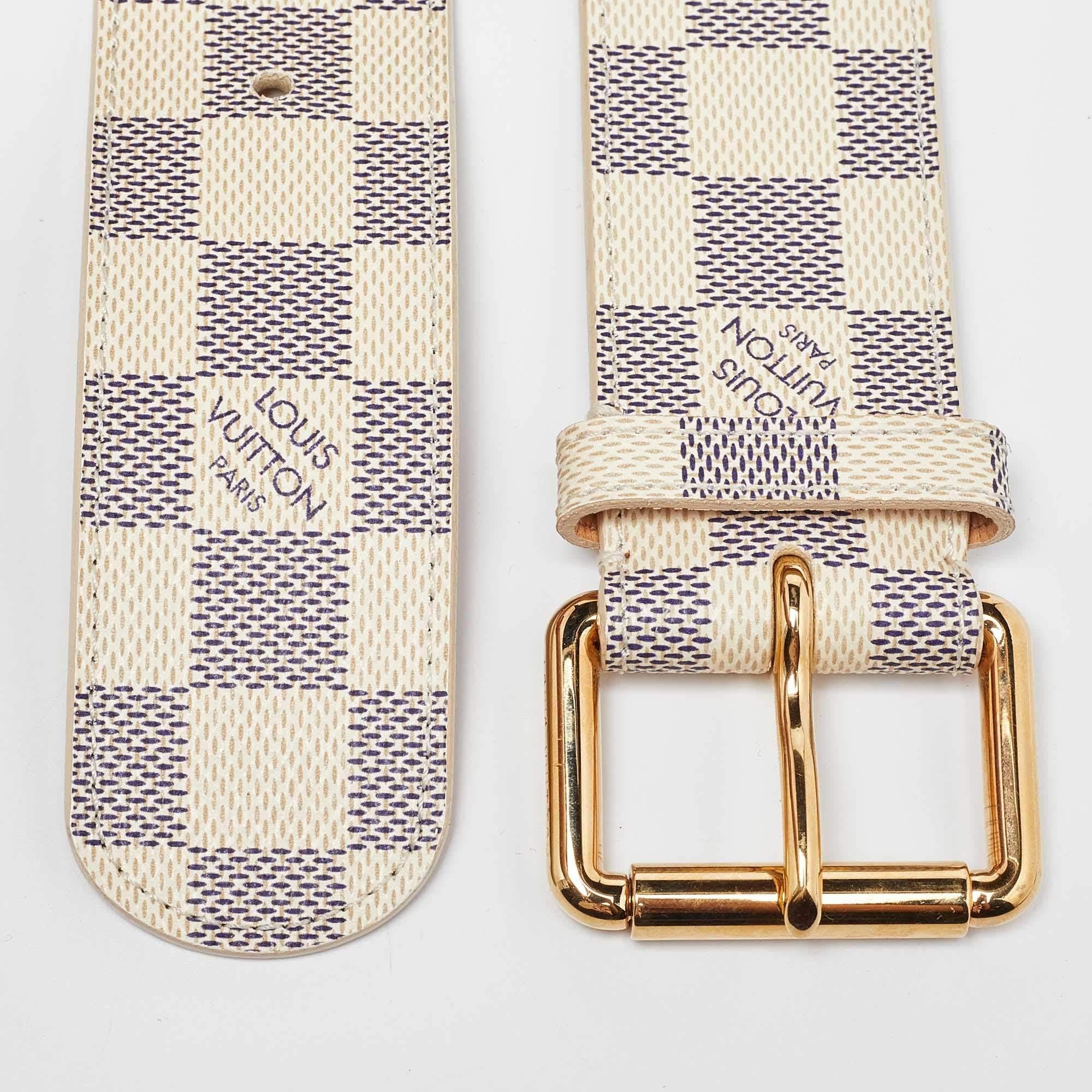 This versatile, elegant belt in Louis Vuitton's iconic Monogram canvas has a gold-tone buckle. The belt is crafted of Damier Azur canvas coated and makes for a prized possession.

