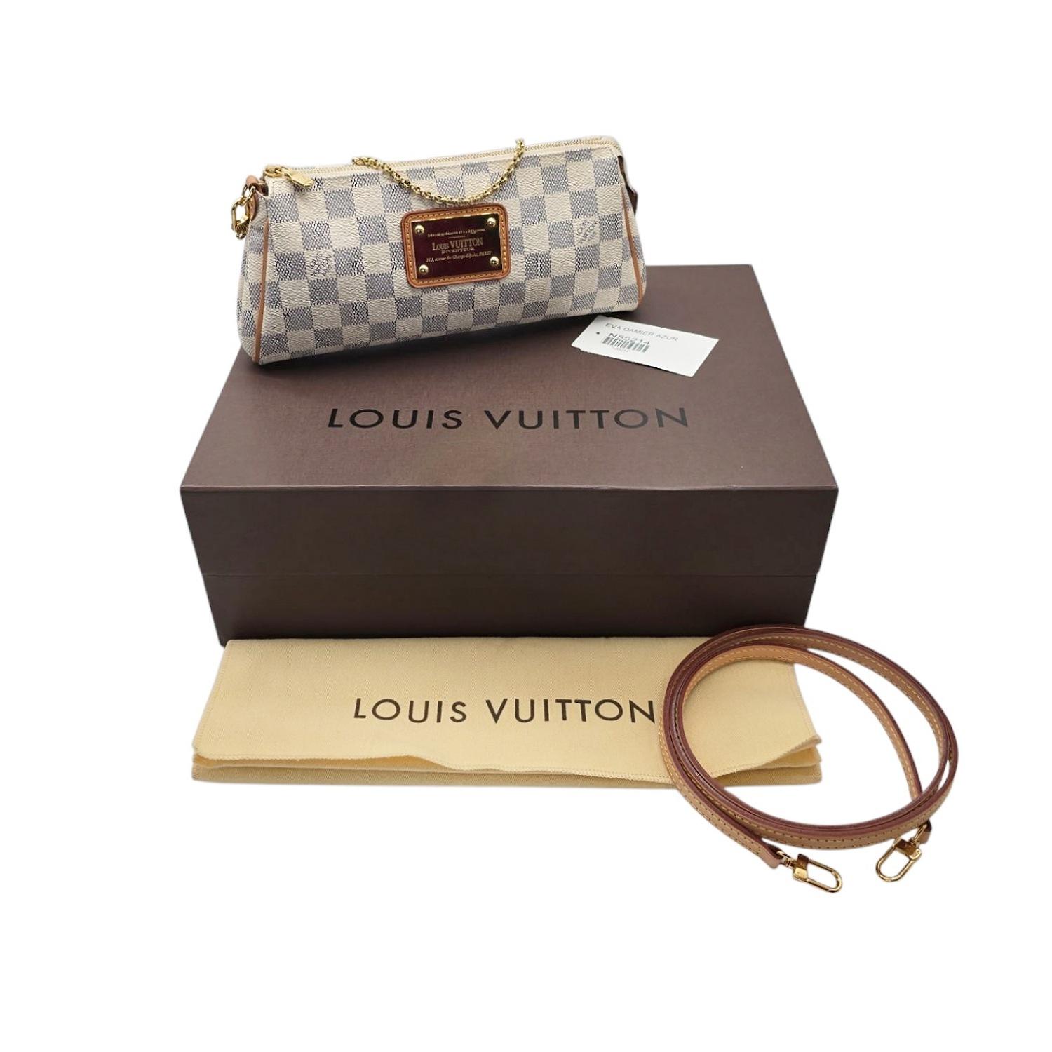 Score the perfect accessory with the Louis Vuitton Damier Azur Canvas Eva Clutch. This playful designer piece features a cowhide trim and single zip closure for easy access. The gold-tone hardware adds a touch of luxury, while the canvas interior