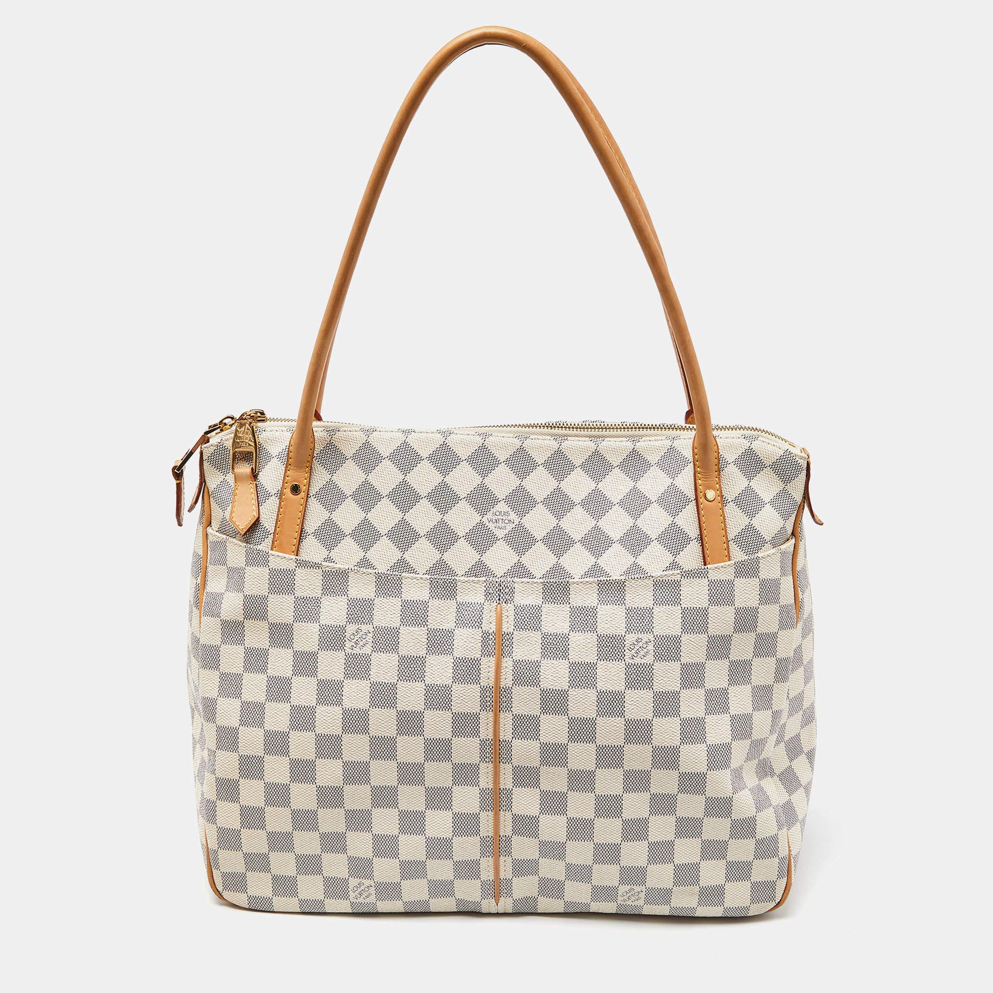 Indulge in timeless luxury with this Louis Vuitton bag for women. Meticulously crafted, this exquisite accessory embodies elegance, functionality, and style, making it the ultimate companion for every sophisticated woman.

Includes: Original