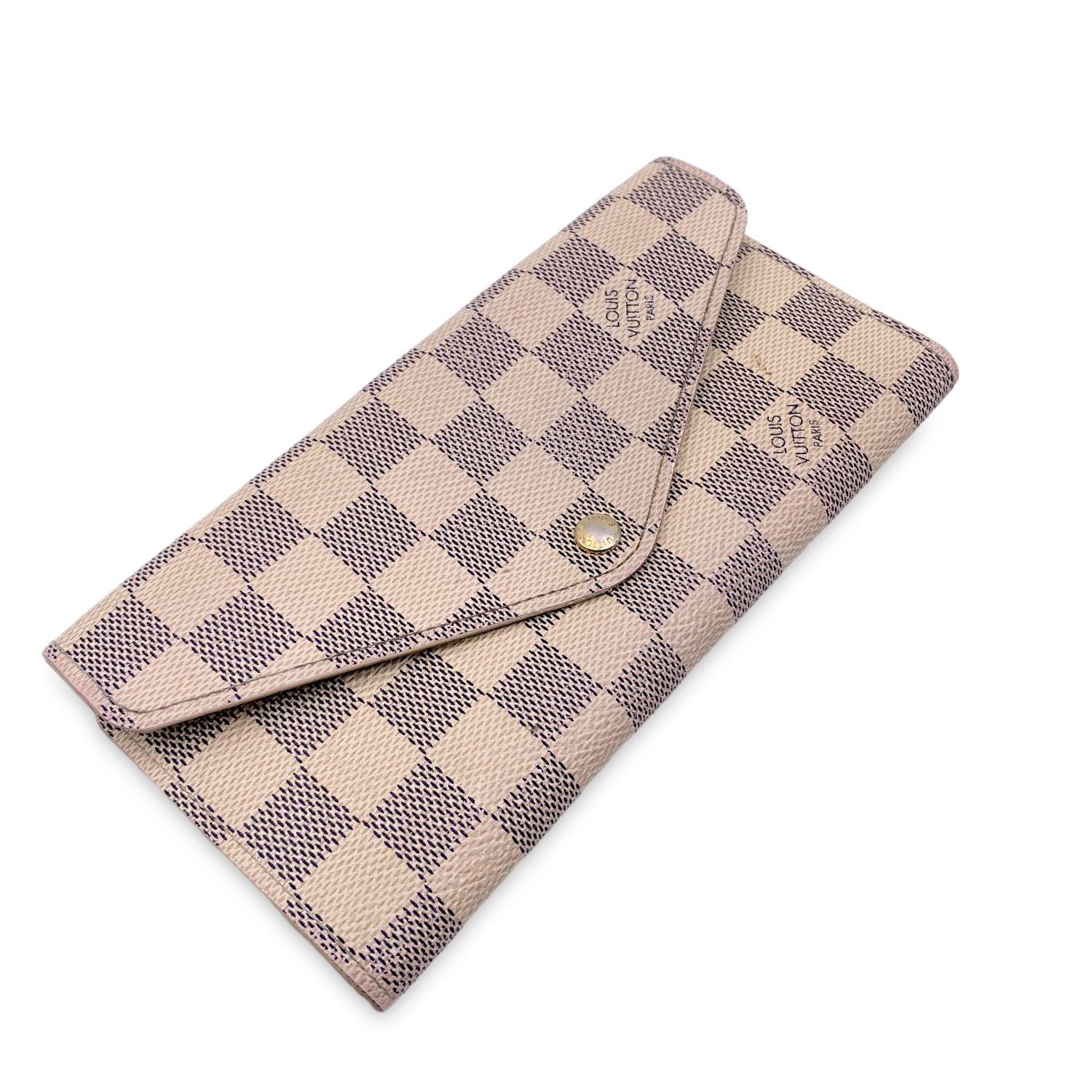 This beautiful Bag will come with a Certificate of Authenticity provided by Entrupy. The certificate will be provided at no further cost. Louis Vuitton long Damier Azur wallet. Mod. Josephine. Flap with button closure. The flap opens to an interior