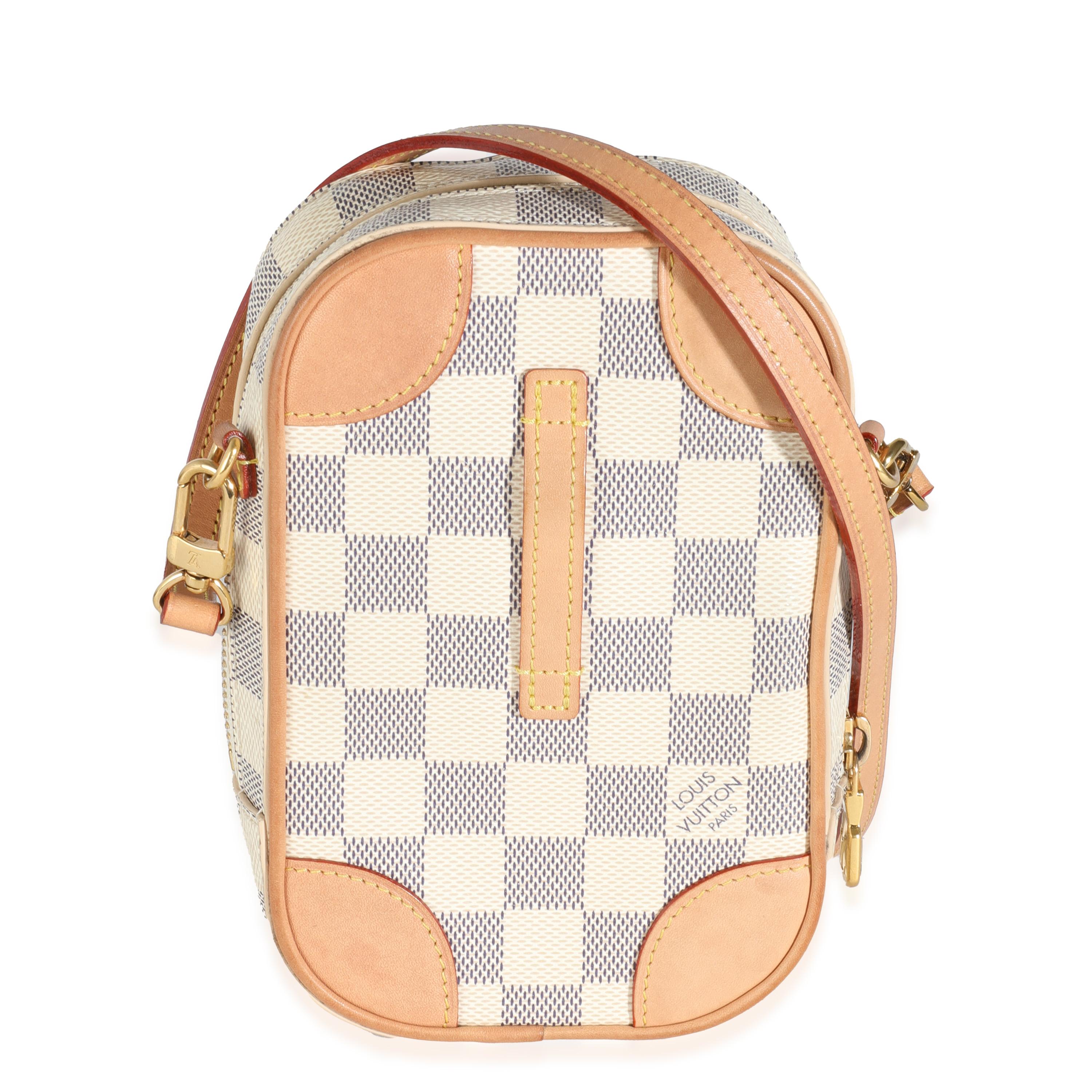 Listing Title: Louis Vuitton Damier Azur Canvas NeoKapi
SKU: 144126
Condition: Pre-owned 
Handbag Condition: Very Good
Condition Comments: Item is in very good condition with minor signs of wear.  Discolorations and patina along vachetta. Light