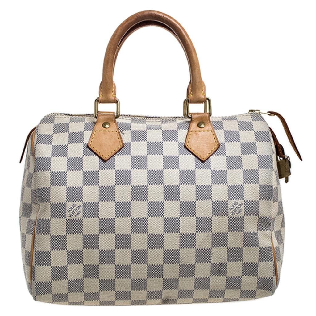 Titled as one of the greatest handbags in the history of luxury fashion, the Speedy from Louis Vuitton was first created for everyday use as a smaller version of their famous Keepall bag. This Speedy comes crafted from Damier Azur canvas with two