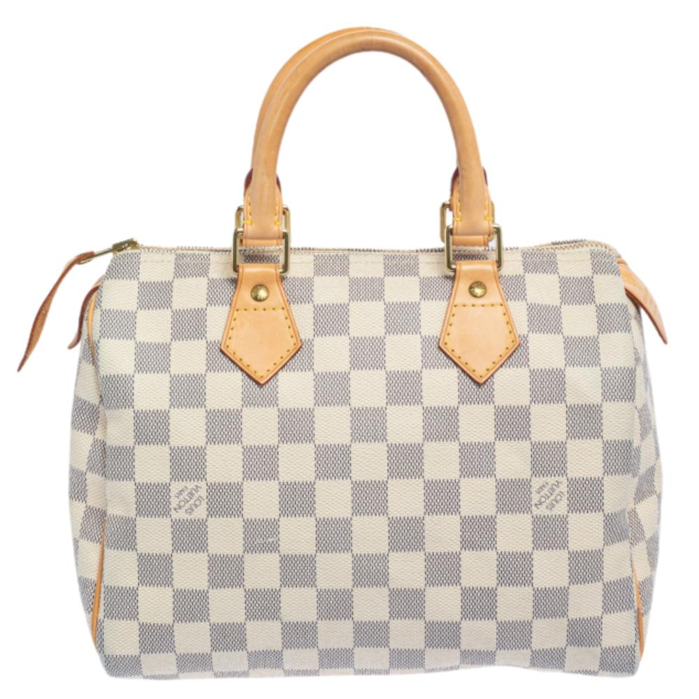 Titled as one of the greatest handbags in the history of fashion, the Speedy from Louis Vuitton was first created for everyday use as a smaller version of their famous Keepall bag. This Speedy comes crafted from Damier Azur canvas & leather with two