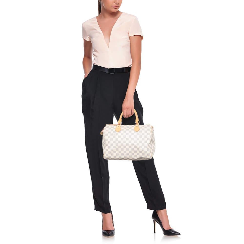 Displaying exquisite craftsmanship, this fabulous bag will certainly live up to your expectations. Featuring a chic design, it is made from luxe materials and has a roomy interior for carrying your essentials.

Includes: Original Dustbag, Padlock