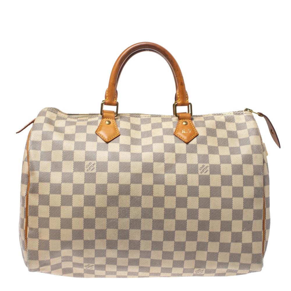 Titled as one of the greatest handbags in the history of luxury fashion, the Speedy from Louis Vuitton was first created for everyday use as a smaller version of their famous Keepall bag. This Speedy comes crafted from Damier Azur coated canvas with