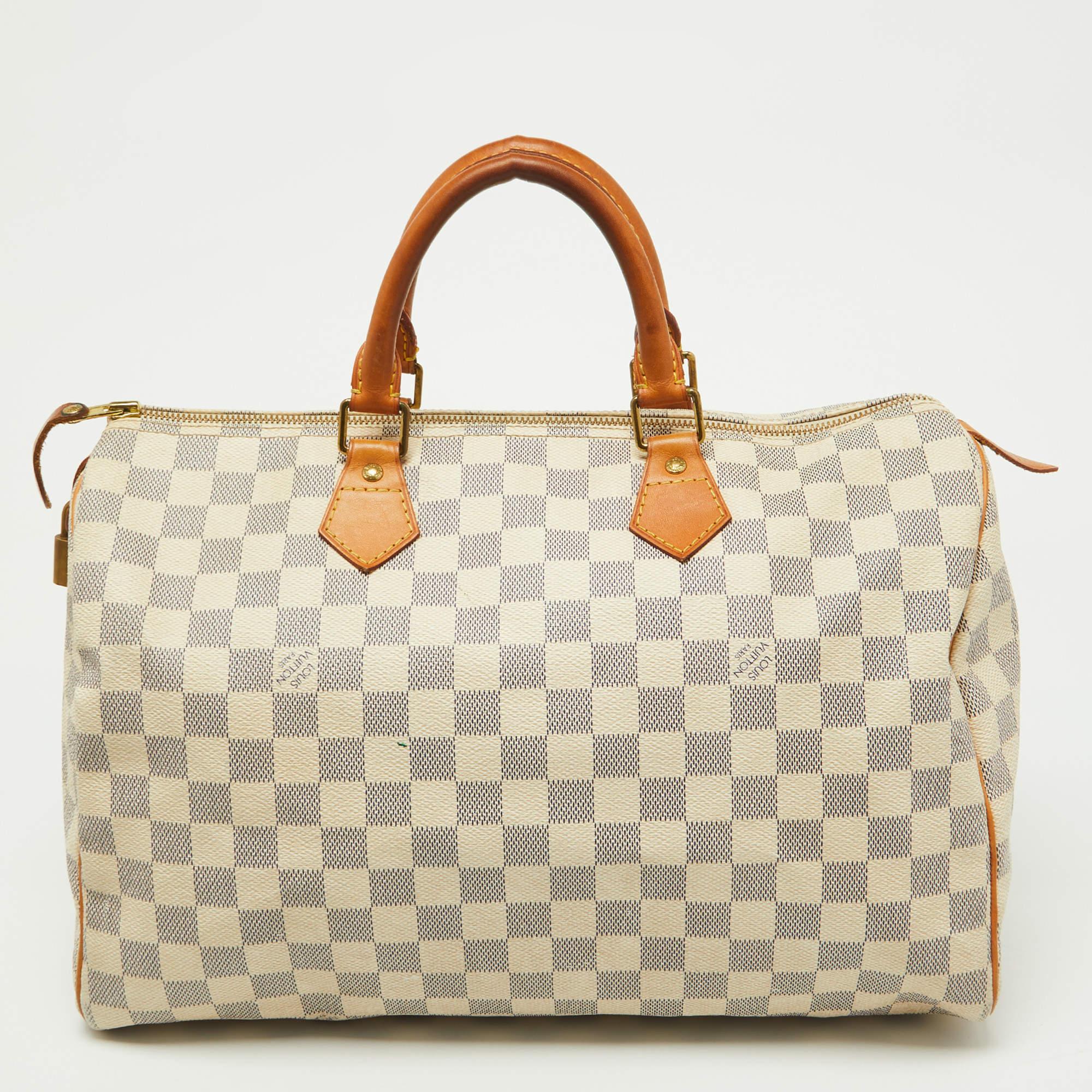 Titled as one of the greatest handbags in the history of luxury fashion, the Speedy from Louis Vuitton was first created for everyday use as a smaller version of their famous Keepall bag. This Speedy comes crafted from Damier Azur coated canvas with